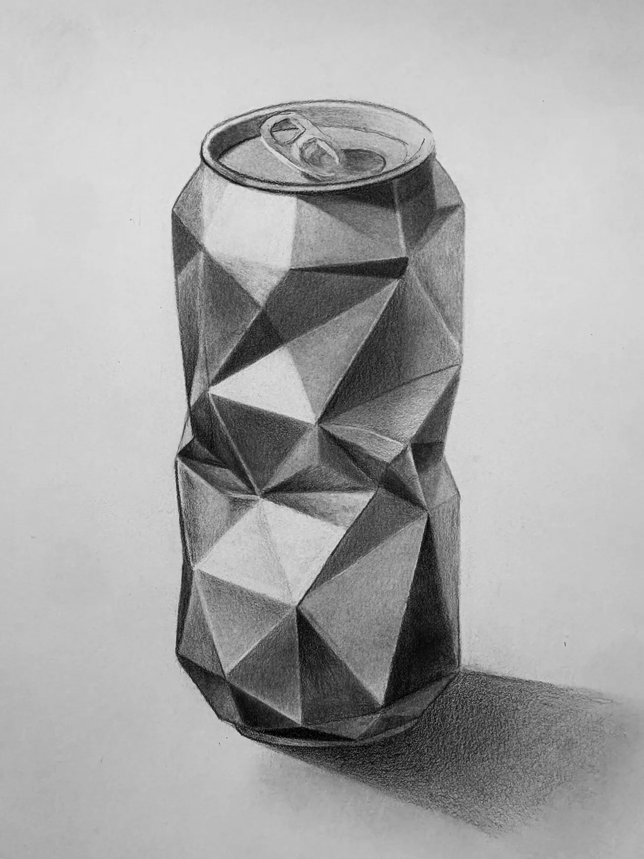 High-contrast graphite study of a crushed can showing metallic reflections and creases on Strathmore Bristol paper.