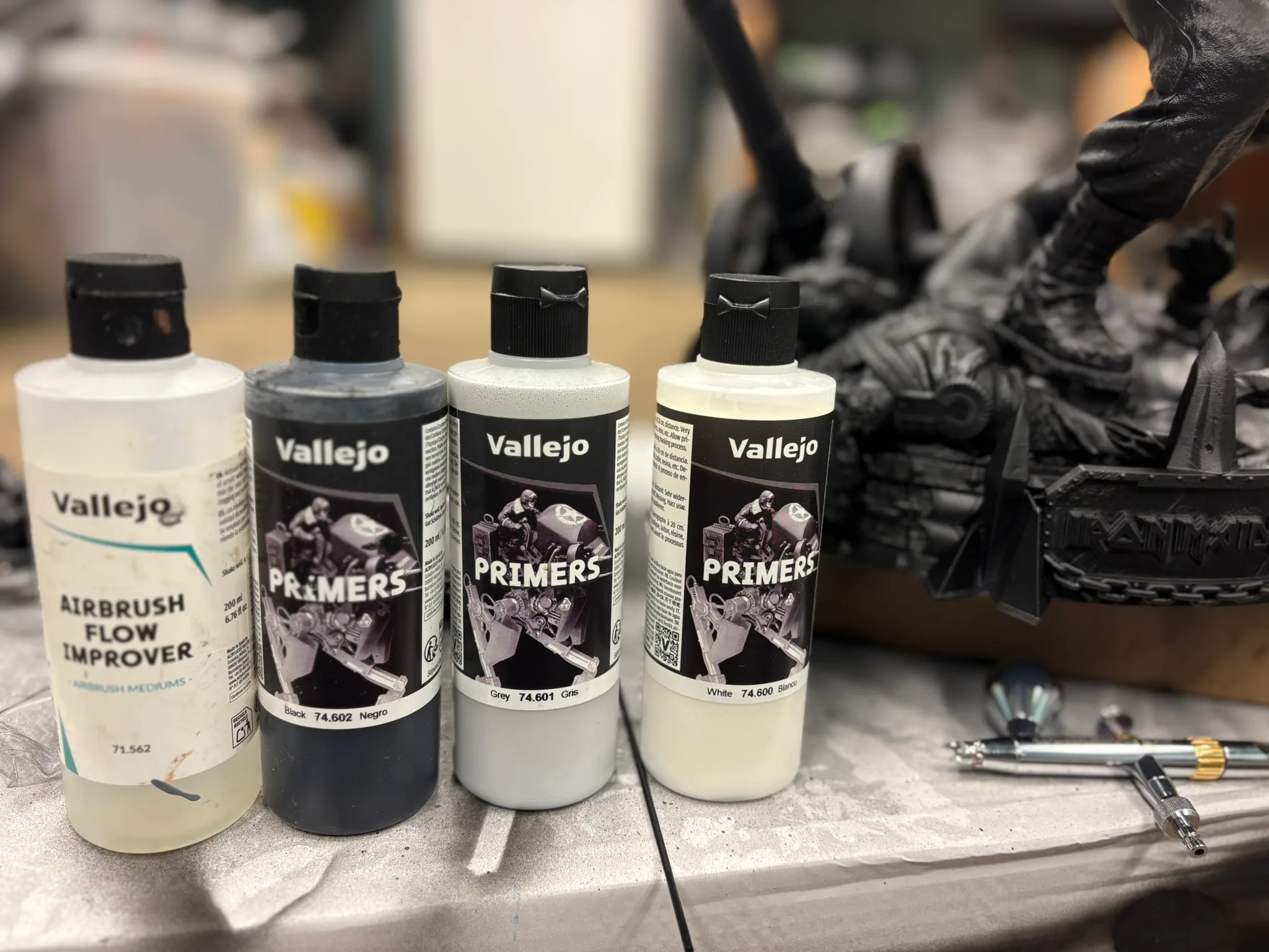 Vallejo primers and Eddie resin figure.